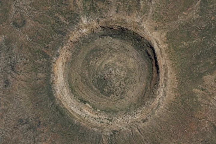 Rappresentazione artistica dell'impatto dell'asteroide di Chicxulub sulla Terra, immagine scientifica