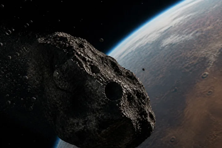 Rappresentazione artistica della sonda DART che si avvicina all'asteroide Dimorphos poco prima dell'impatto
