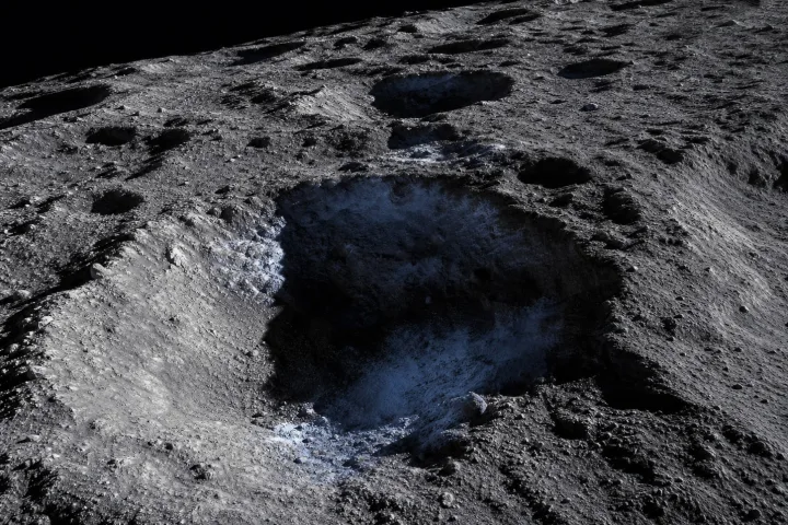 Superficie lunare vicino al polo sud con crateri in ombra, immagine reale NASA